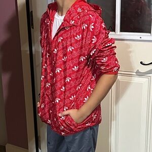 Adidas Red Hooded Jacket with Logo Pattern